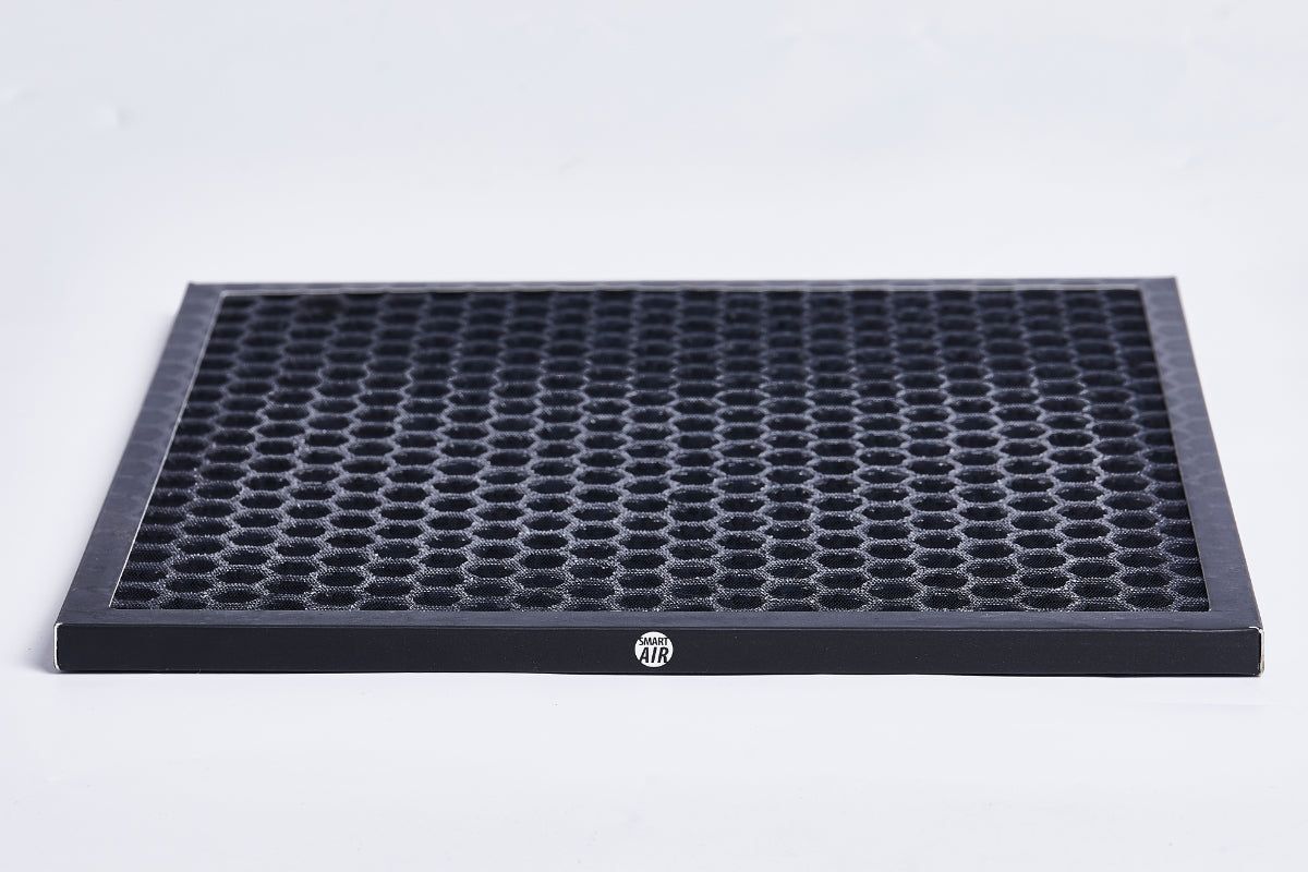 Close up of Activated Carbon Filter for Smart Air Sqair on light grey background