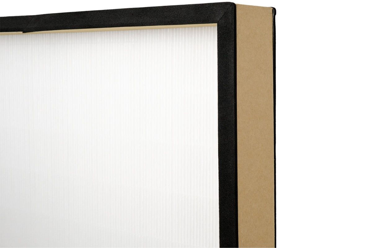 Closeup of Smart Air Blast HEPA filter with cardboard frame on white background