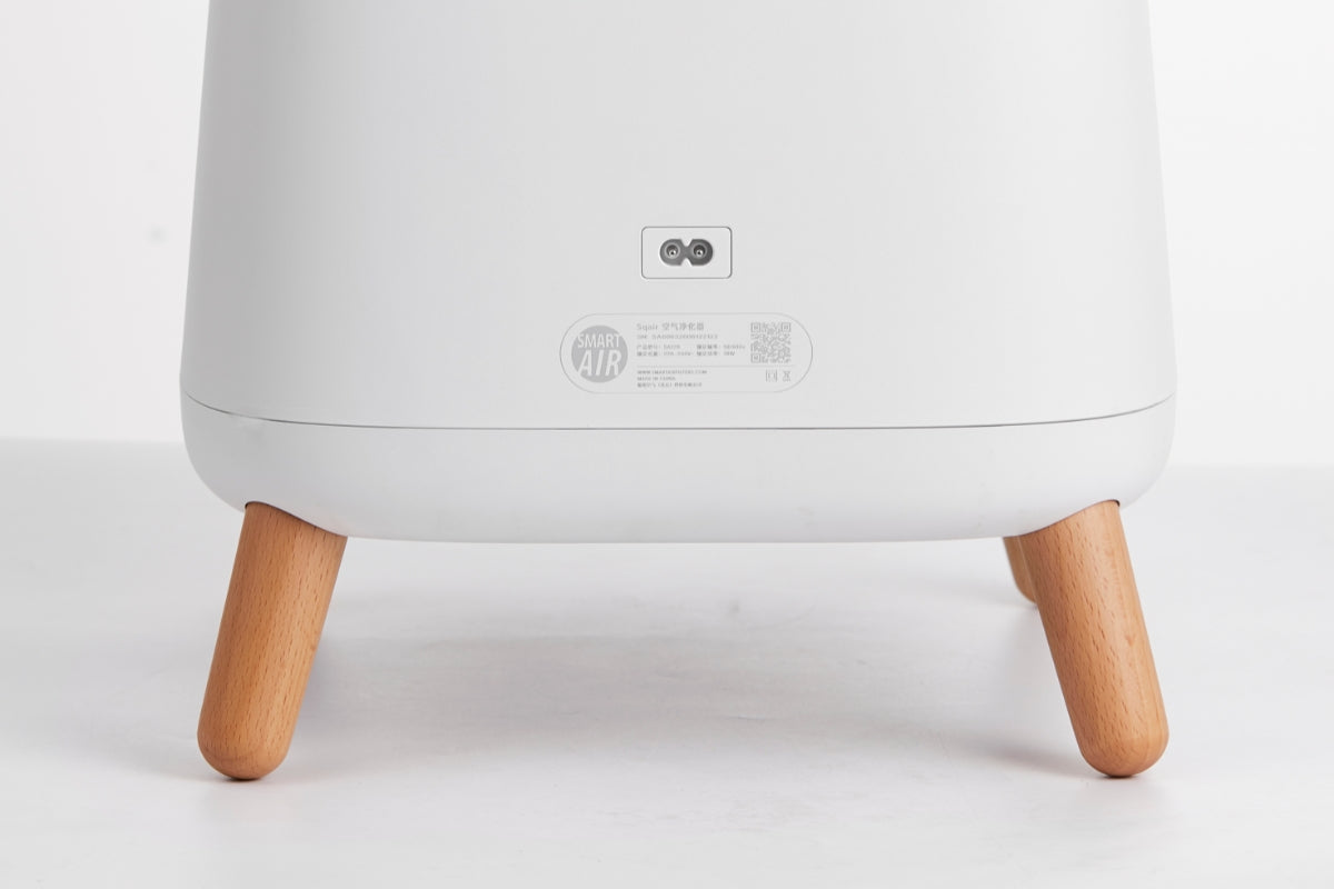 View of the back of Smart Air Sqair SA600 showing bottom half plus wooden legs on white background